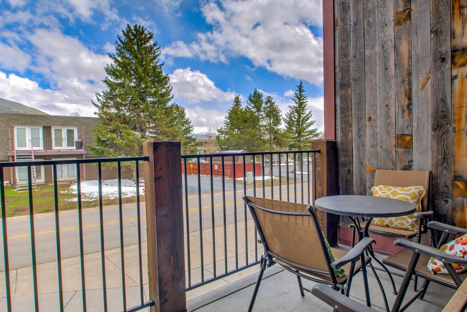 235 La Bonte Street, Unit 108 Dillon, CO 80435 - Photo 15 of 38 a view of a chair and table in the balcony