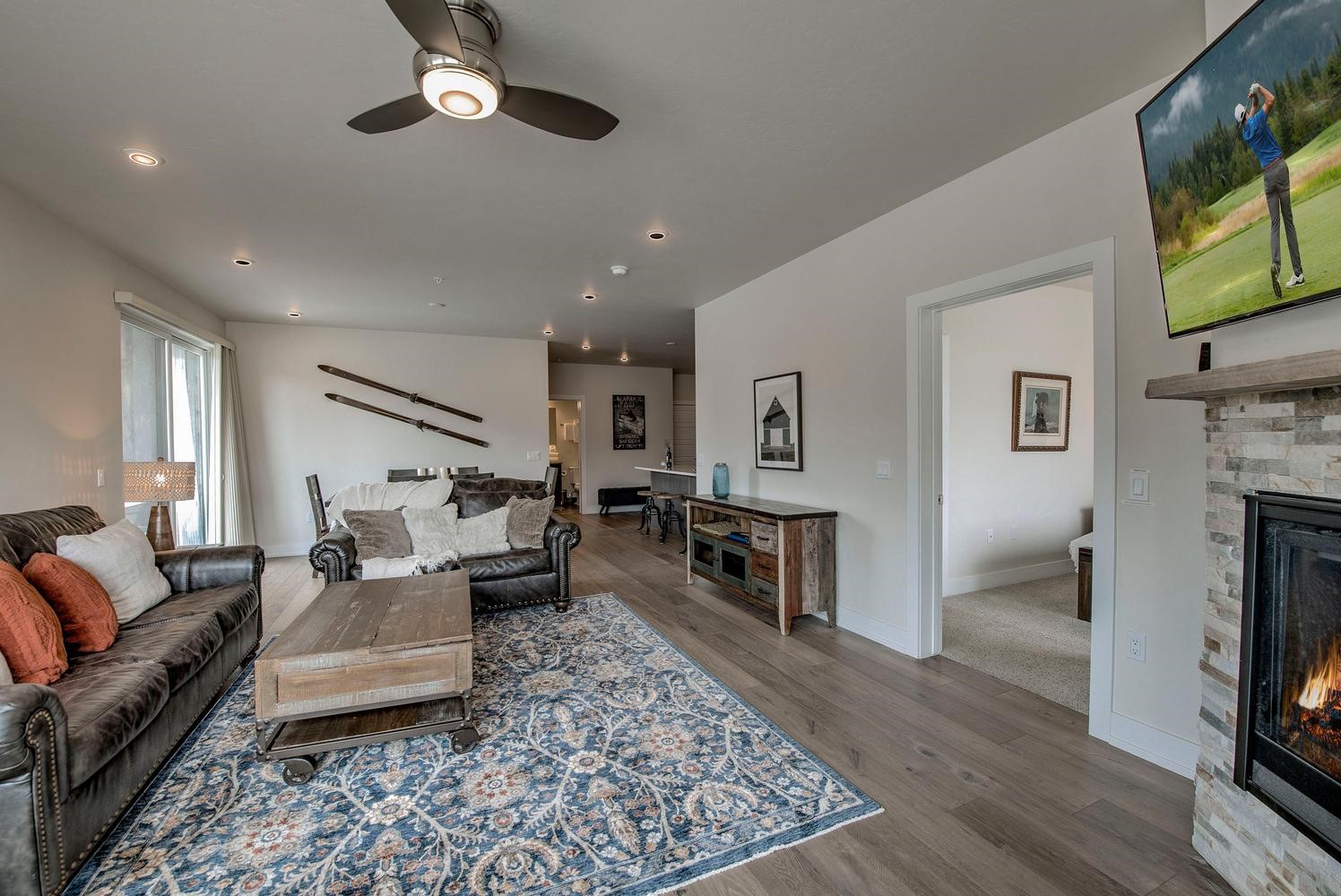 235 La Bonte Street, Unit 108 Dillon, CO 80435 - Photo 2 of 38 a living room with furniture flat screen tv and a fireplace