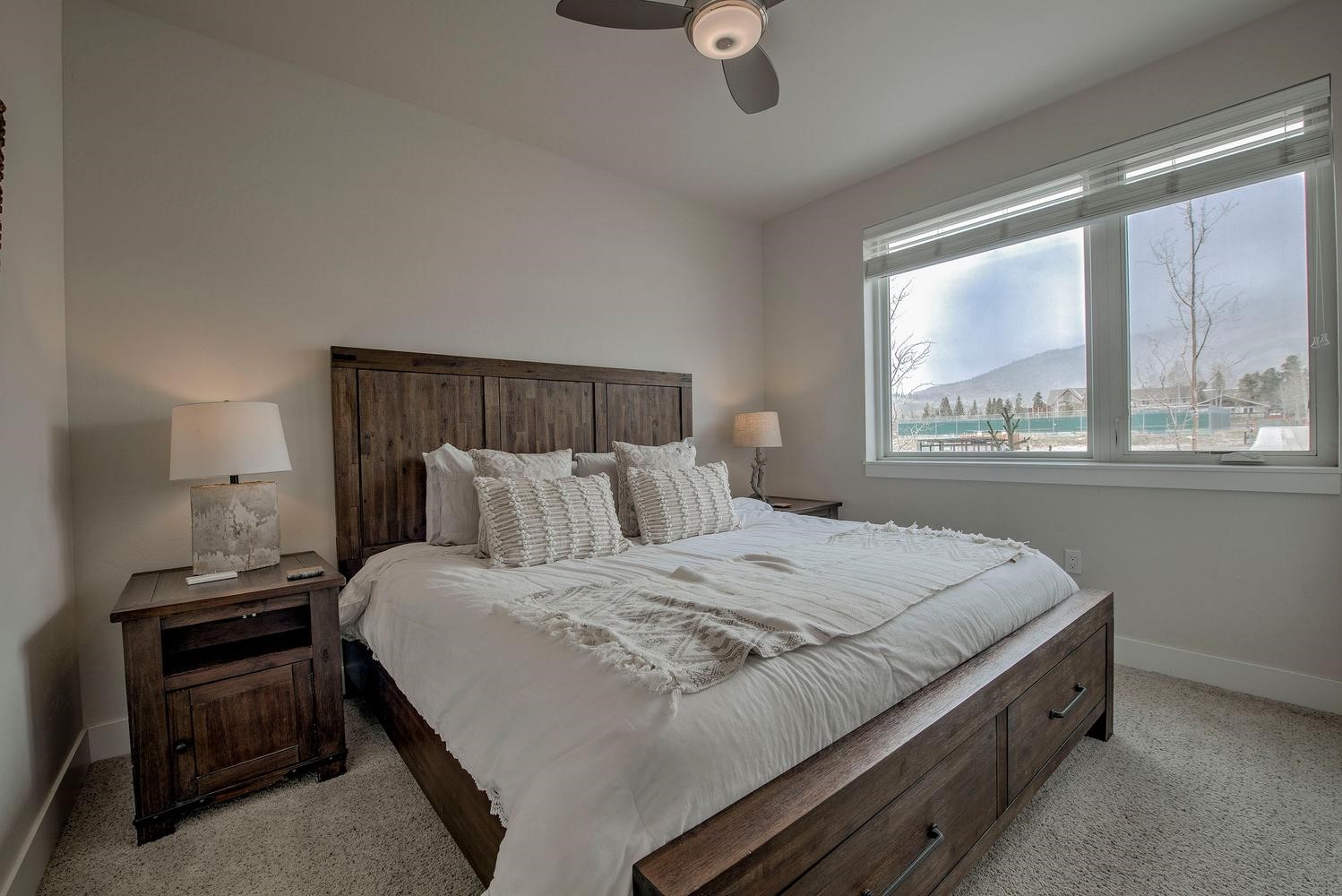 235 La Bonte Street, Unit 108 Dillon, CO 80435 - Photo 21 of 38 a bedroom with a bed and a window