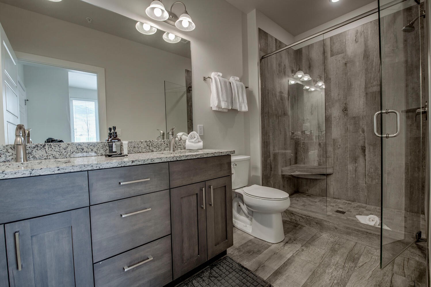 235 La Bonte Street, Unit 108 Dillon, CO 80435 - Photo 24 of 38 a bathroom with a sink a toilet and shower