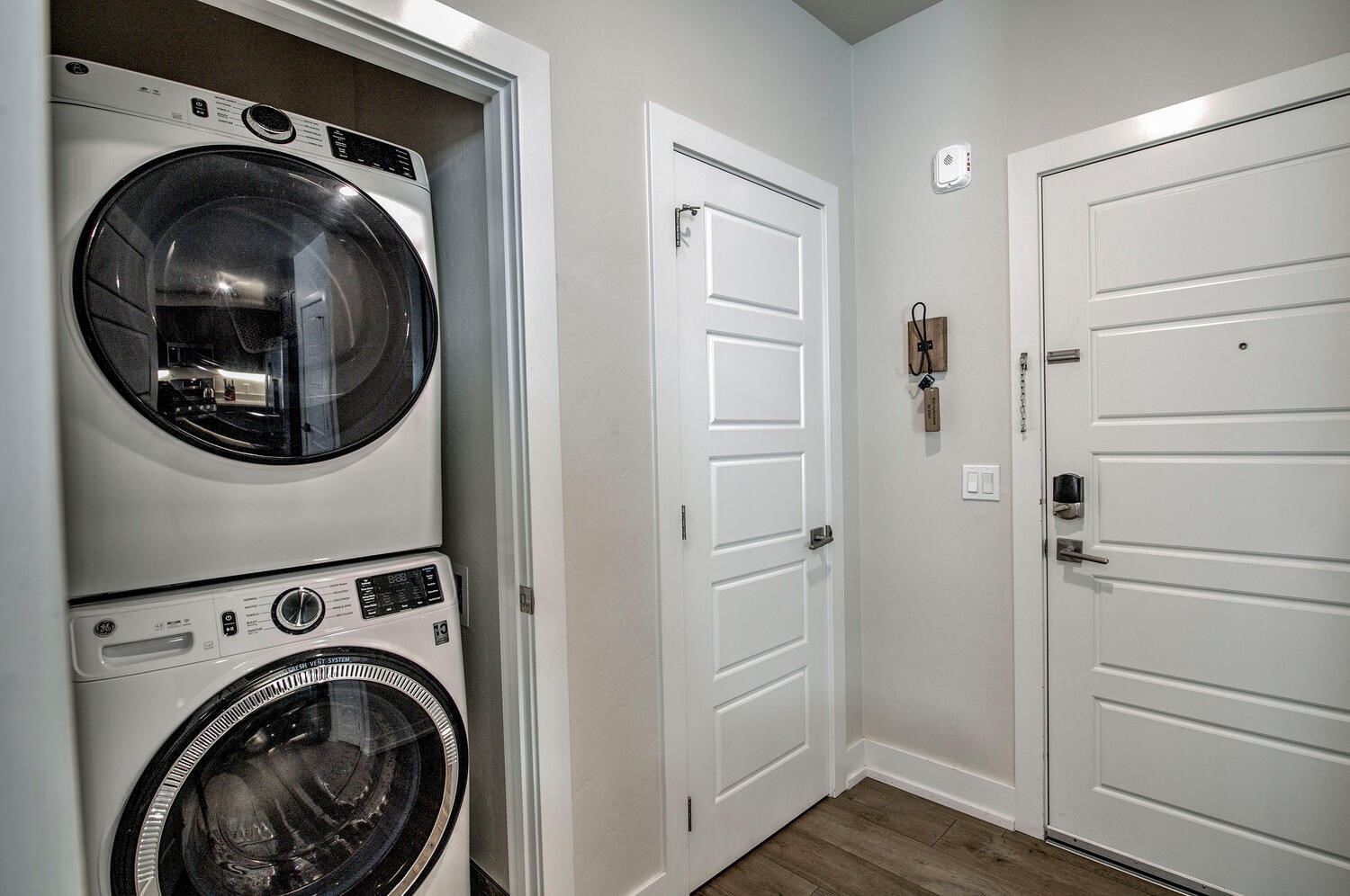 235 La Bonte Street, Unit 108 Dillon, CO 80435 - Photo 31 of 38 a view of a hallway with washer and dryer