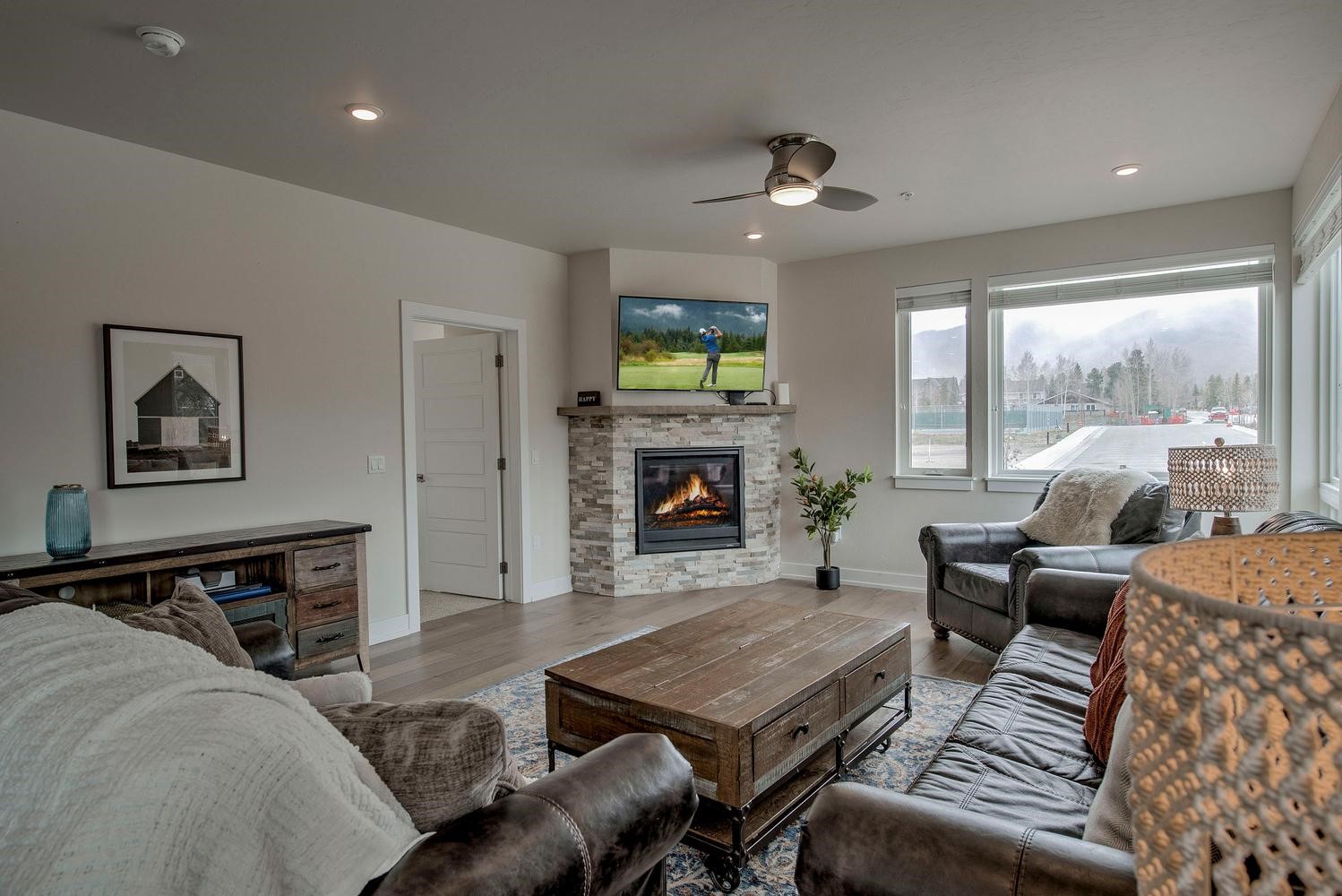 235 La Bonte Street, Unit 108 Dillon, CO 80435 - Photo 4 of 38 a living room with furniture a flat screen tv and a fireplace