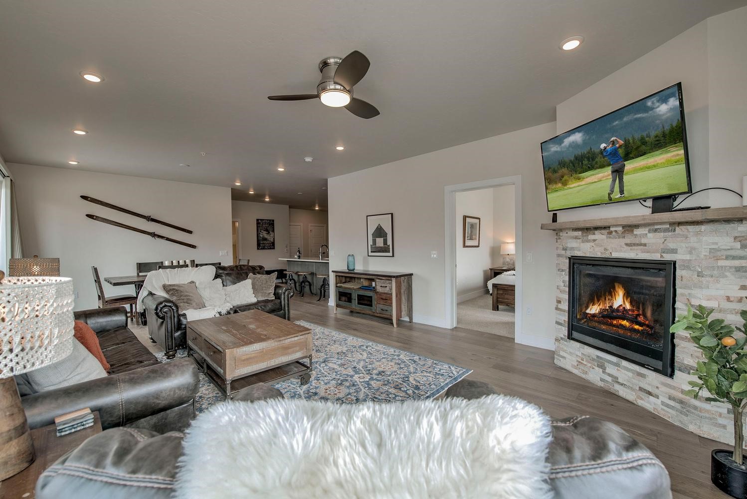 235 La Bonte Street, Unit 108 Dillon, CO 80435 - Photo 5 of 38 a living room with furniture a flat screen tv and a fireplace