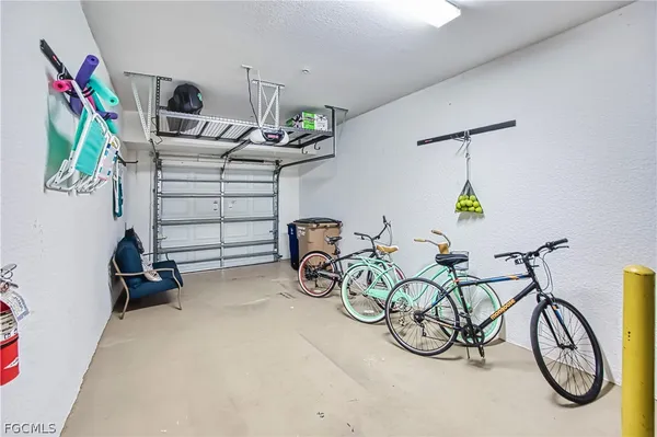 a view of a bike storage and utility room