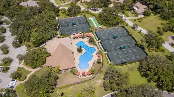 an aerial view of residential house with outdoor space