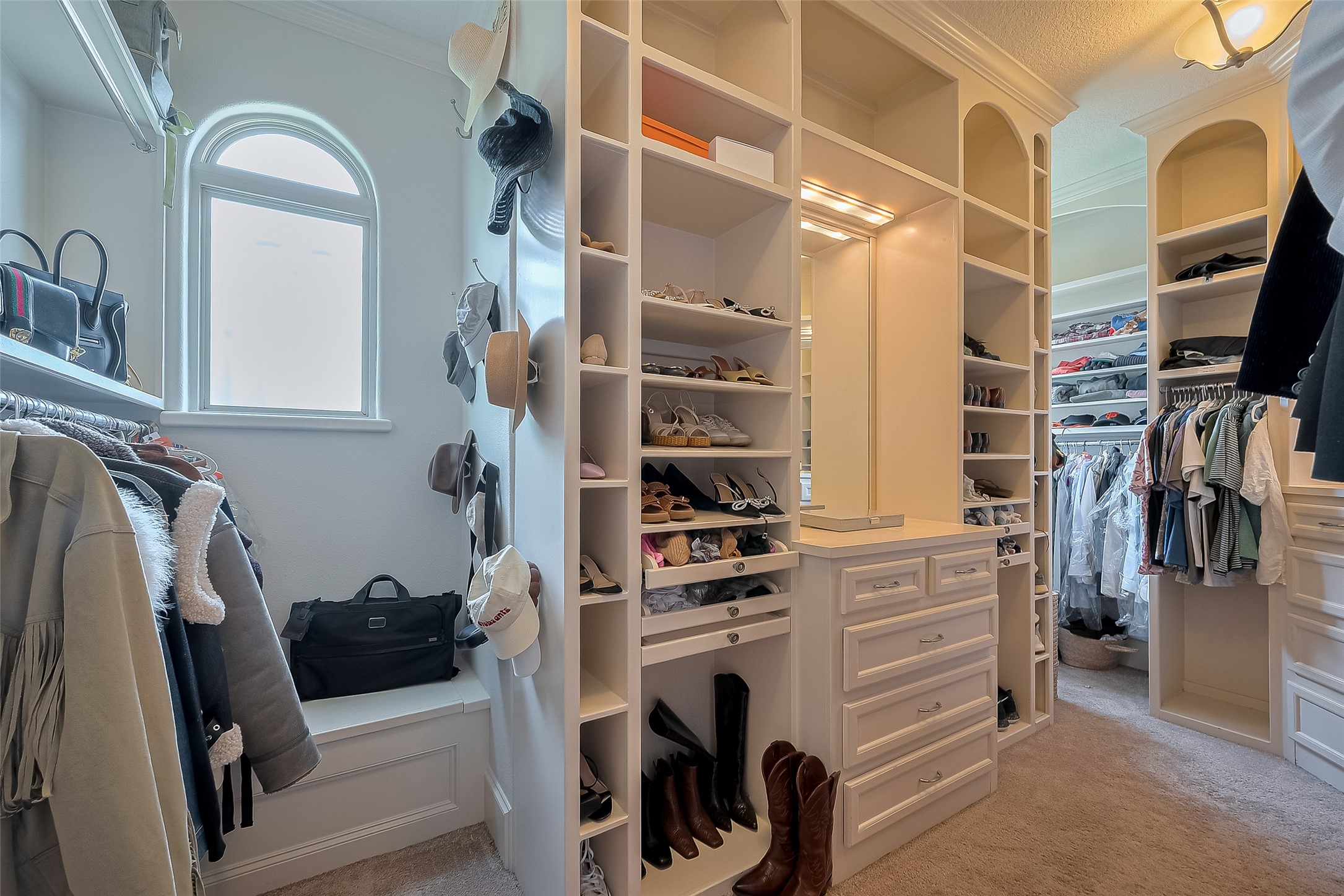 6419 Rodrigo Street Houston, TX 77007 - Photo 34 of 35 One of 2 walk-in closets for the primary bedroom. Plenty of room for all your wardrobe needs.