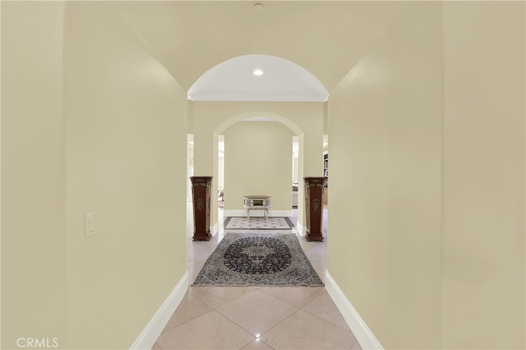 7231 Brandon Court Riverside, CA 92506 - Photo 13 of 69 a view of a hallway with a white walls