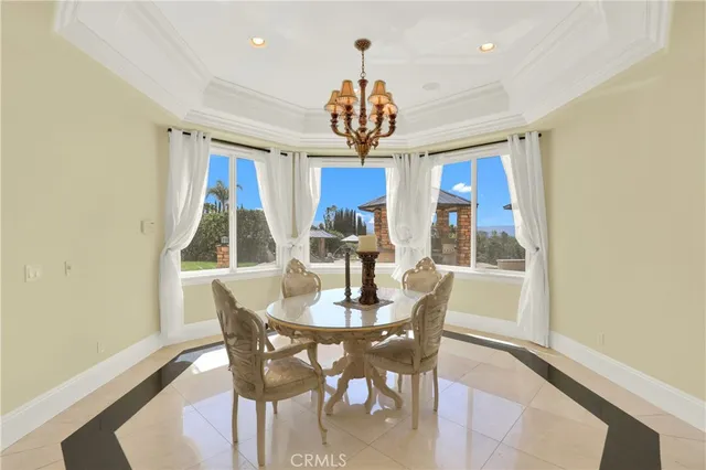 a view of living room with furniture and floor to ceiling window