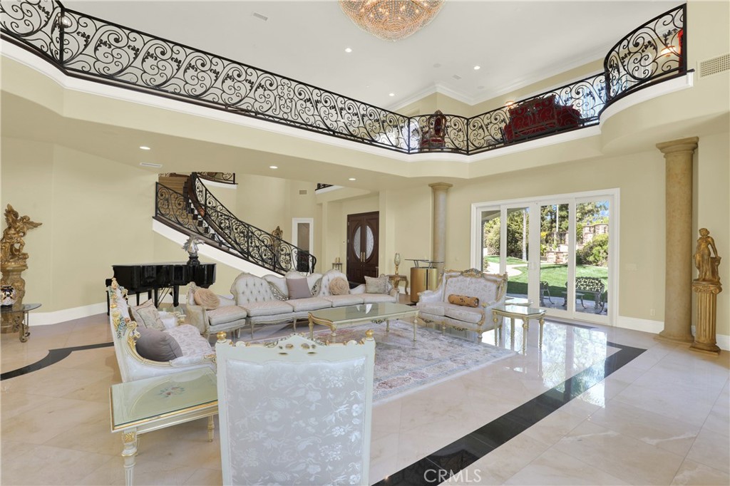 7231 Brandon Court Riverside, CA 92506 - Photo 22 of 69 a view of living room with furniture and floor to ceiling window
