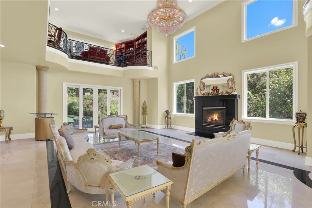 7231 Brandon Court Riverside, CA 92506 - Photo 23 of 69 a living room with furniture fireplace and a large window