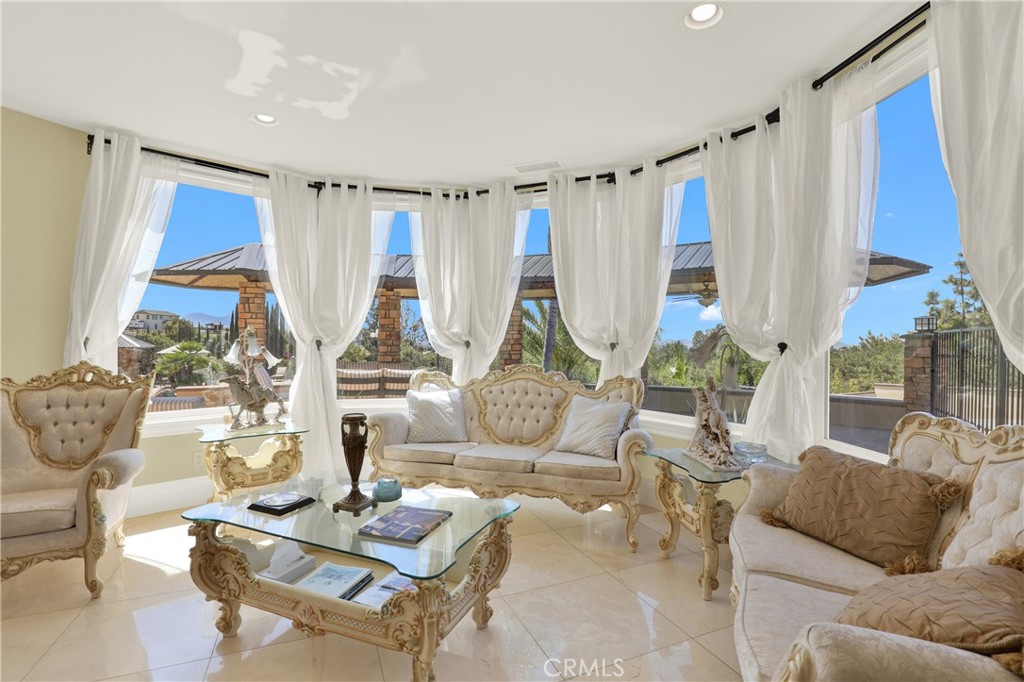 7231 Brandon Court Riverside, CA 92506 - Photo 24 of 69 a living room with furniture and a large window