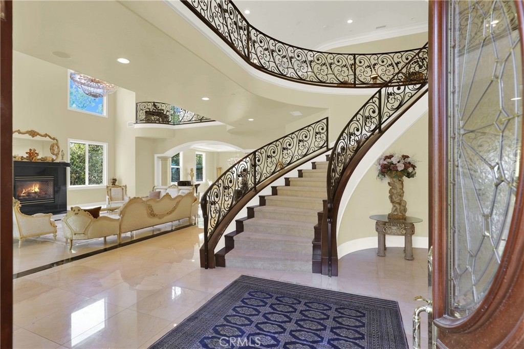7231 Brandon Court Riverside, CA 92506 - Photo 27 of 69 a view of entryway and hall with wooden floor