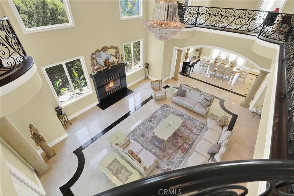 7231 Brandon Court Riverside, CA 92506 - Photo 33 of 69 a living room with furniture and a fireplace