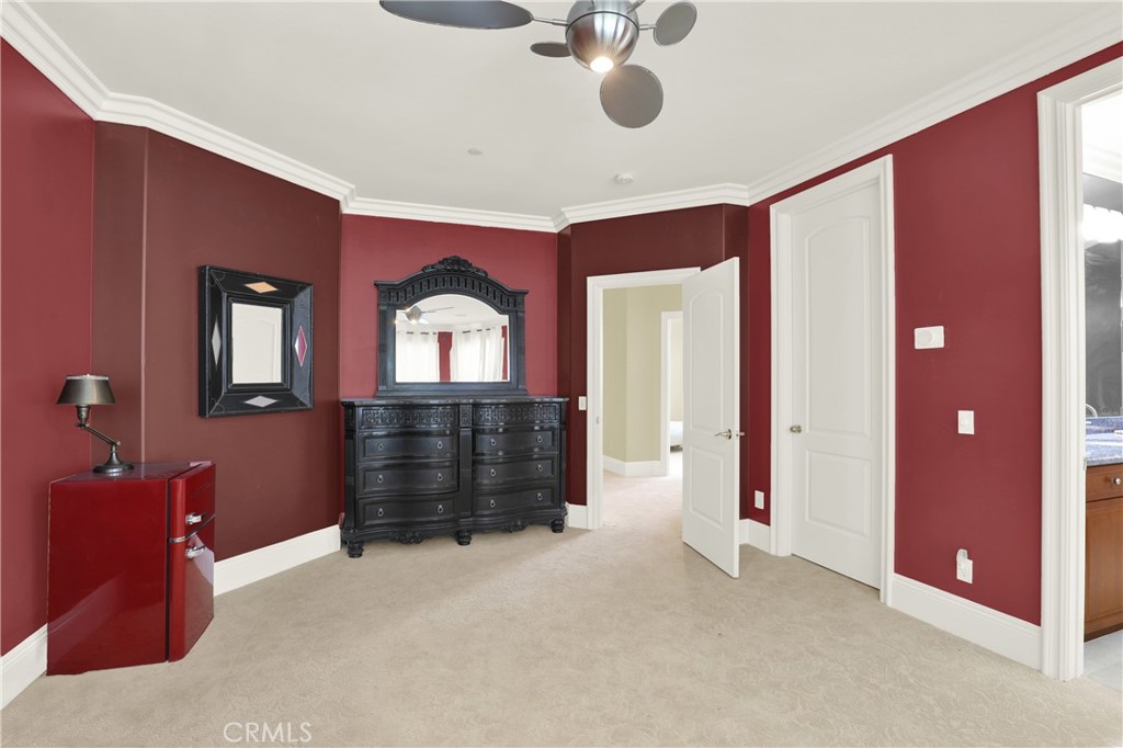 7231 Brandon Court Riverside, CA 92506 - Photo 47 of 69 a spacious bedroom with a bed and a dresser