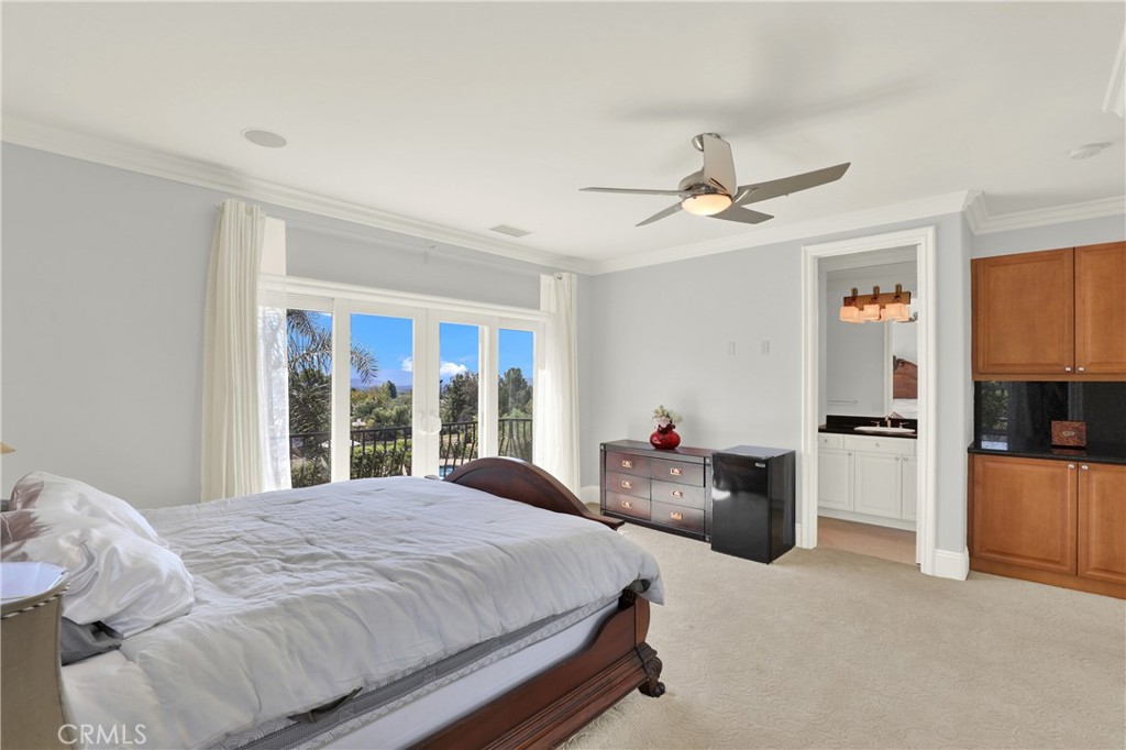 7231 Brandon Court Riverside, CA 92506 - Photo 51 of 69 a bed room with a bed and a television