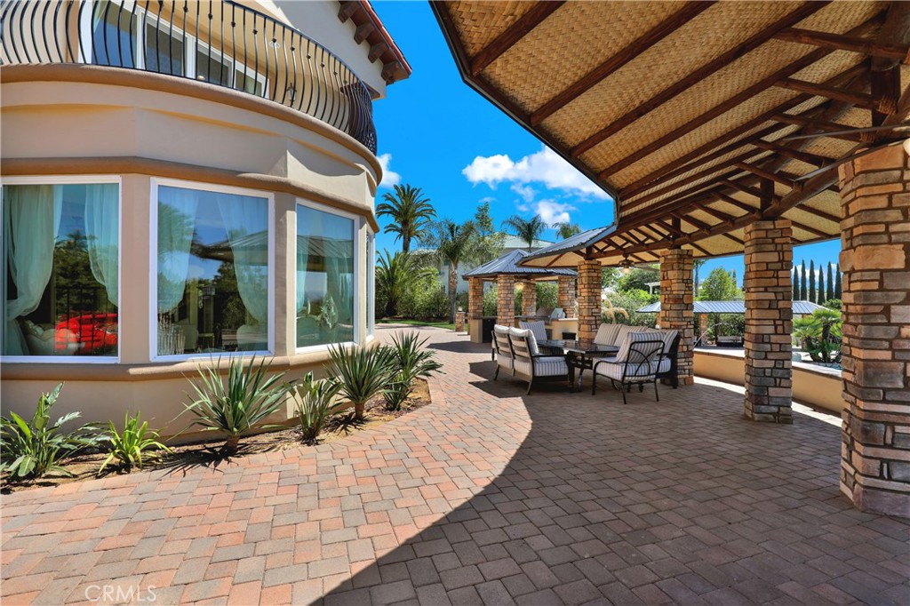 7231 Brandon Court Riverside, CA 92506 - Photo 62 of 69 a view of a chairs and tables in patio