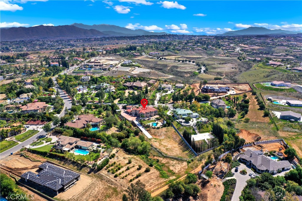 7231 Brandon Court Riverside, CA 92506 - Photo 7 of 69 an aerial view of residential houses with outdoor space and parking