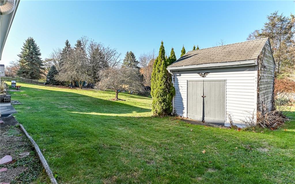 1711 Mercer Street Aliquippa, PA 15001 - Photo 21 of 23 a view of a house with backyard and garden