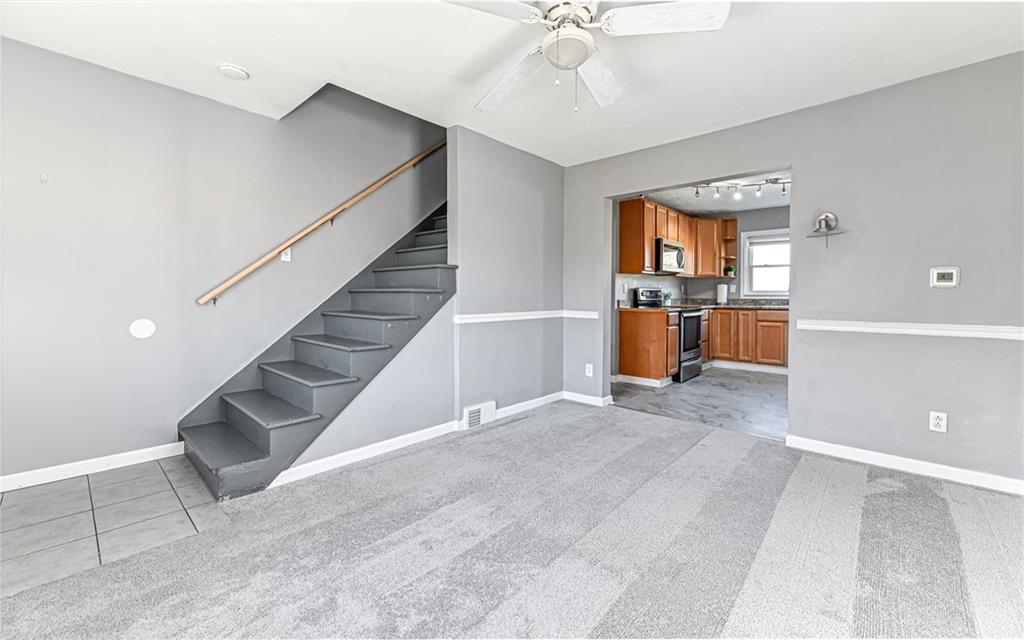 1711 Mercer Street Aliquippa, PA 15001 - Photo 10 of 23 a view of a kitchen with a sink and cabinets