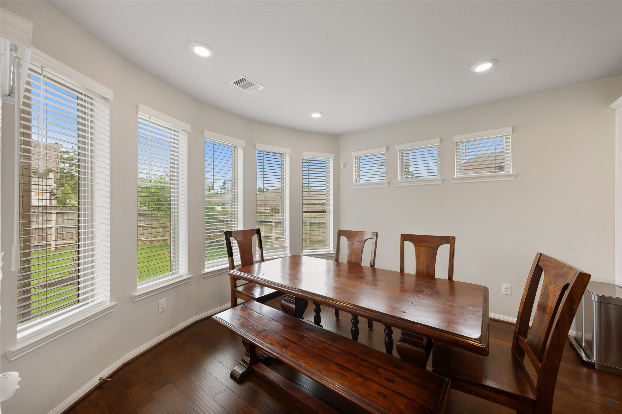 17323 Grand Canyon Road Conroe, TX 77302 - Photo 6 of 33 Bay window wraps the dining room in light.