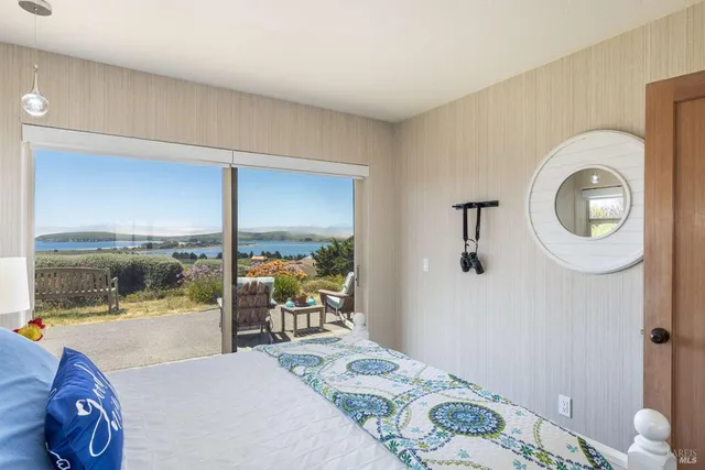 a view of a livingroom with furniture and a garage