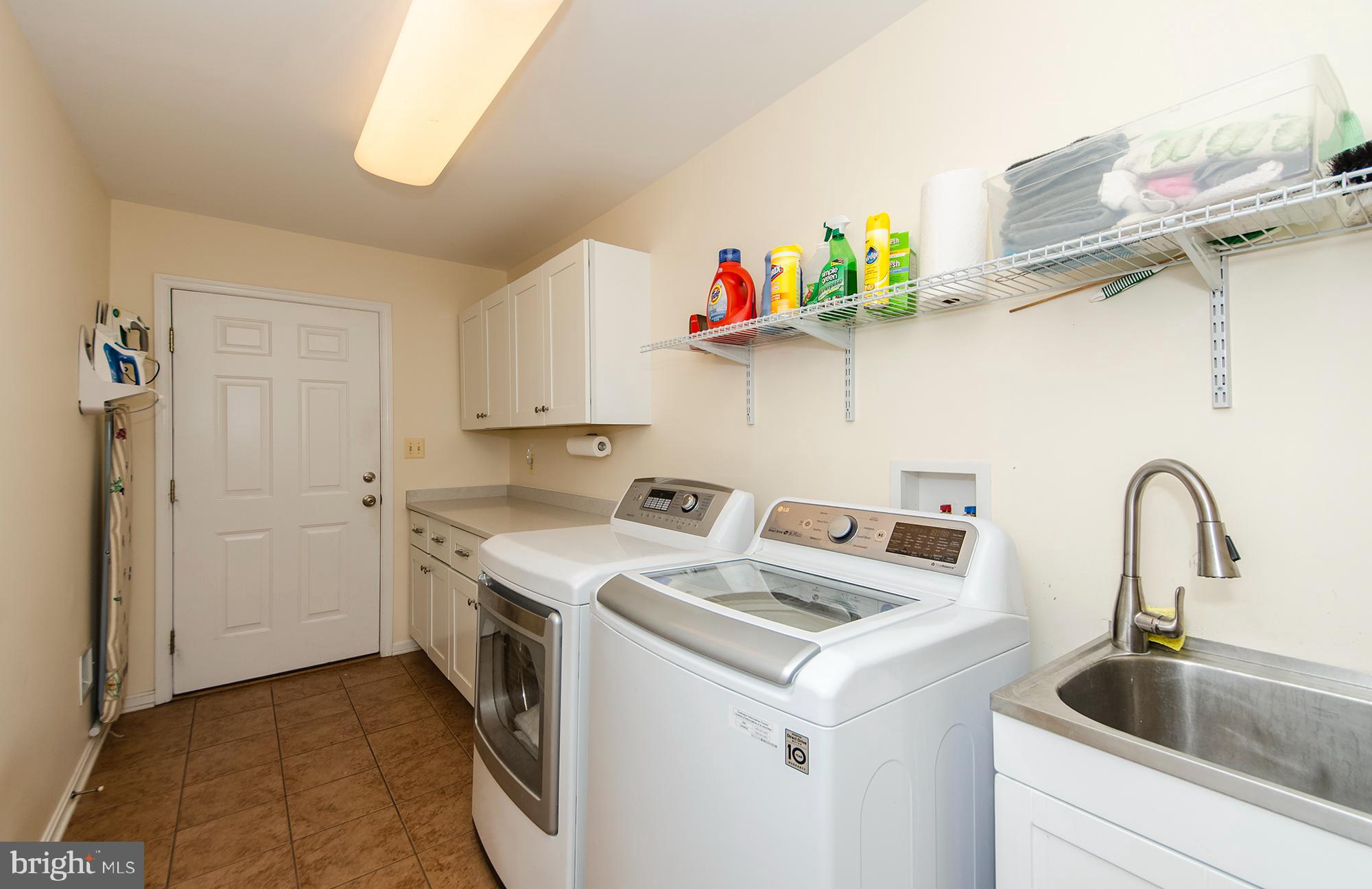 6532 Elnido Drive McLean, VA 22101 - Photo 17 of 45 Main level laundry room with access to garage
