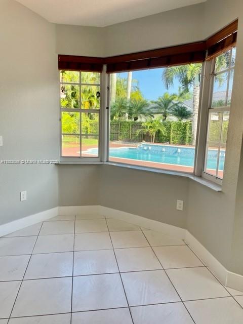 13710 Southwest 36th Street Miami, FL 33175 - Photo 14 of 31 a view of an empty room with a window