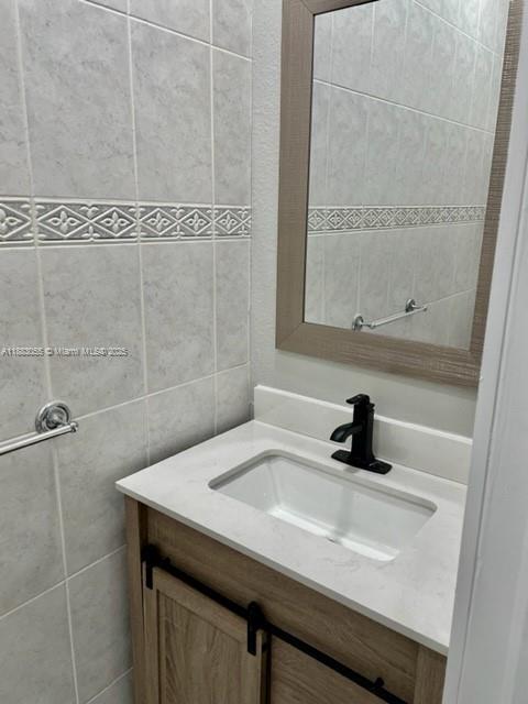 13710 Southwest 36th Street Miami, FL 33175 - Photo 19 of 31 a bathroom with a sink and a shower