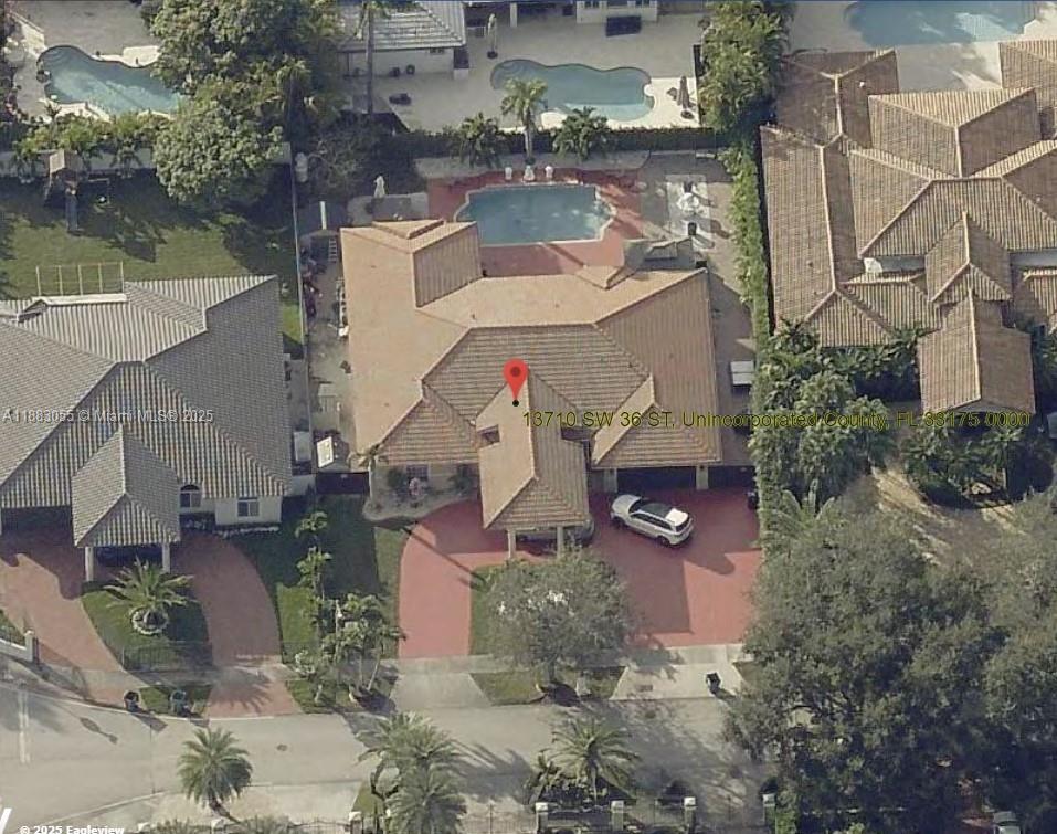 13710 Southwest 36th Street Miami, FL 33175 - Photo 30 of 31 an aerial view of a house with a lake view