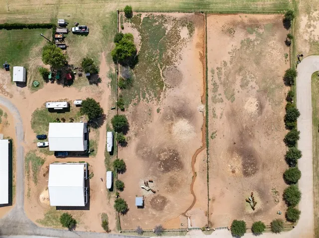 an aerial view of a house with a garden
