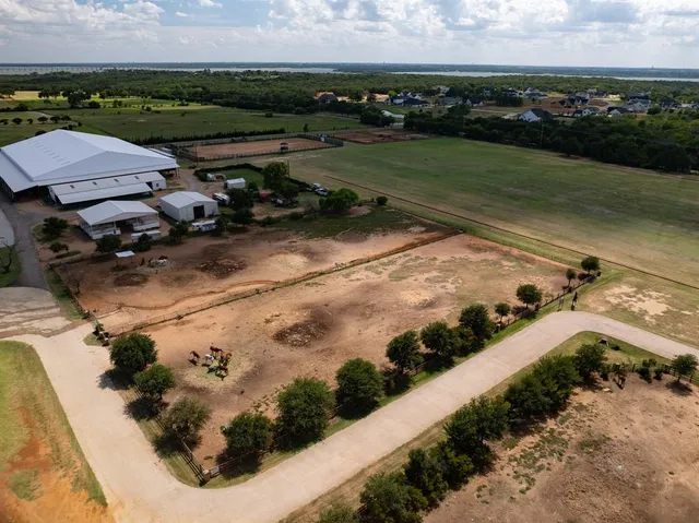 a view of a lake with a yard
