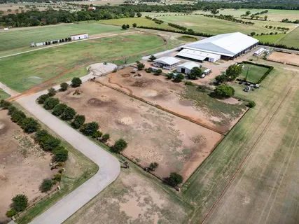 an aerial view of a house with a garden