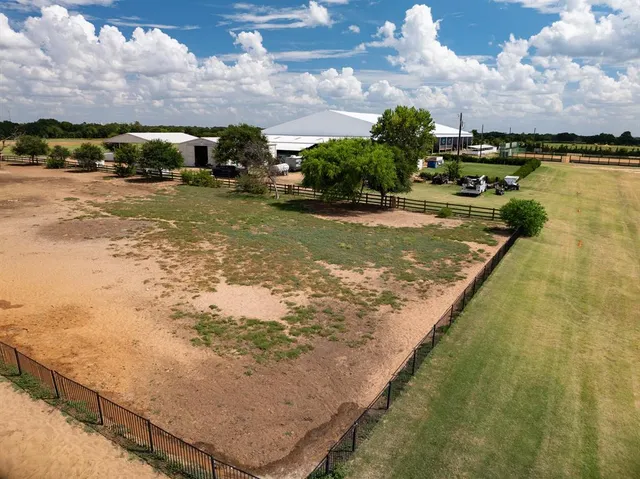 a view of a yard with an ocean