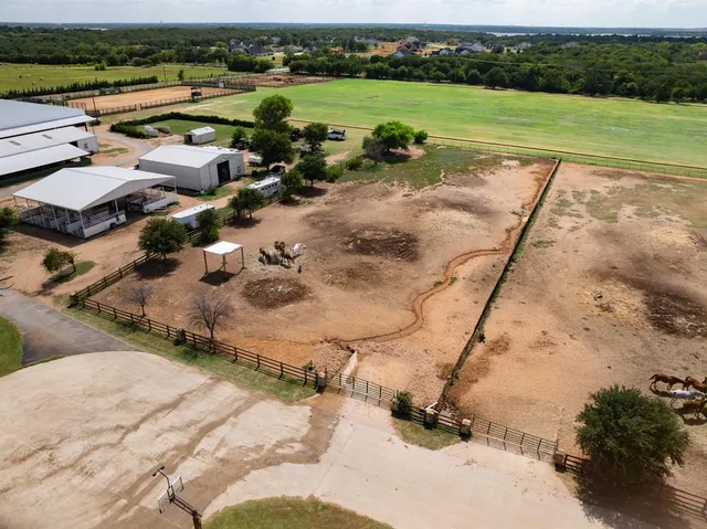 an aerial view of a house with a garden