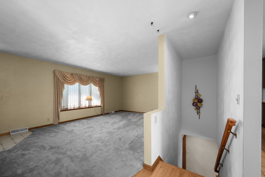 207 Amber Lane Geneseo, IL 61254 - Photo 18 of 57 an empty room with windows