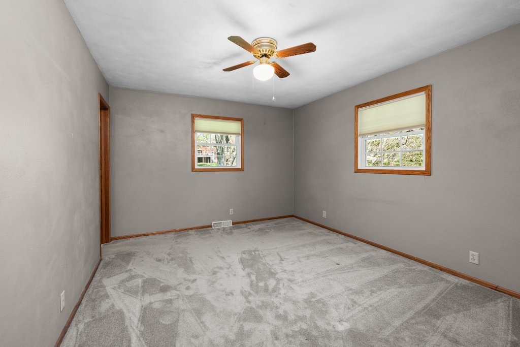 207 Amber Lane Geneseo, IL 61254 - Photo 20 of 57 a view of an empty room with a window