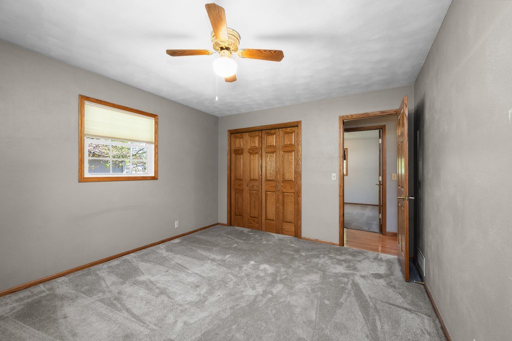 207 Amber Lane Geneseo, IL 61254 - Photo 22 of 57 a view of an empty room with a window