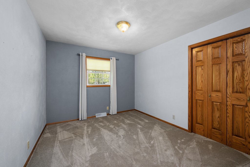 207 Amber Lane Geneseo, IL 61254 - Photo 27 of 57 a view of empty room with window