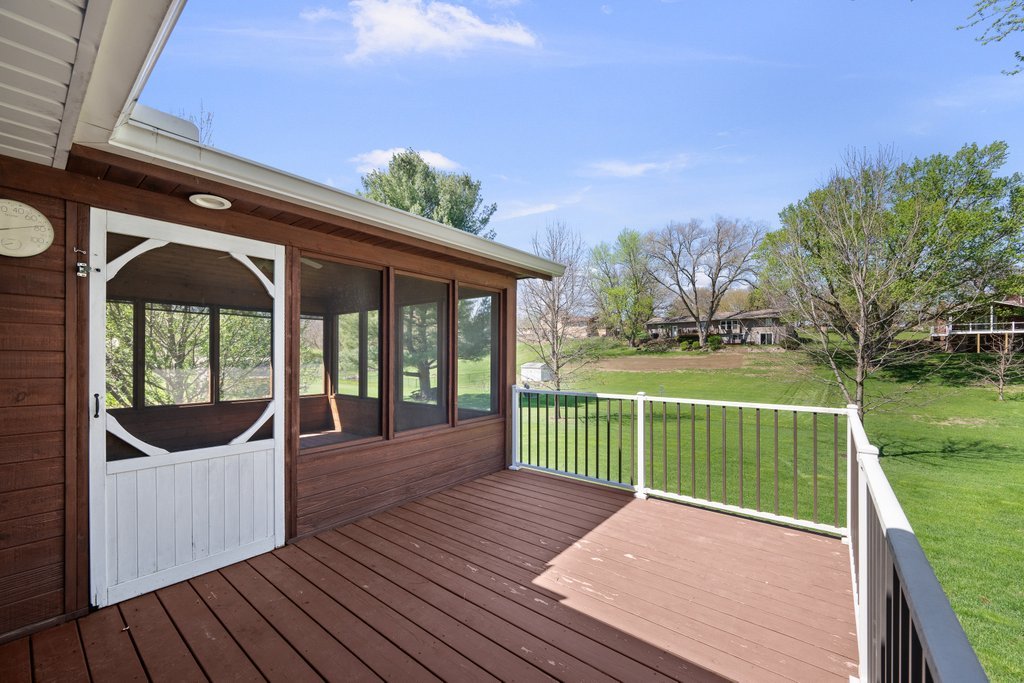 207 Amber Lane Geneseo, IL 61254 - Photo 45 of 57 a view of a deck with a yard