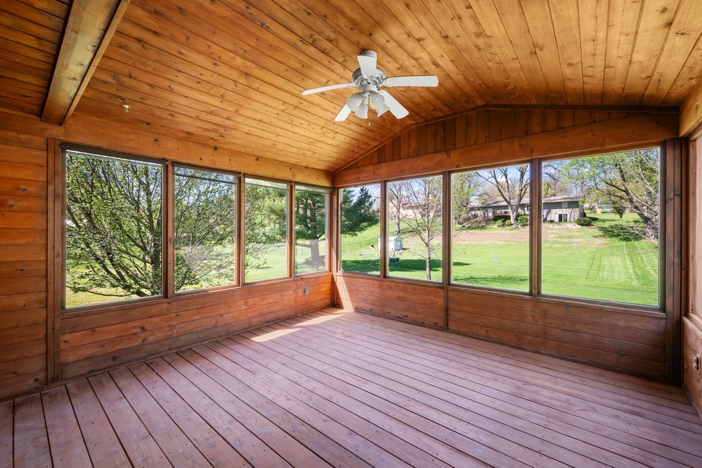 207 Amber Lane Geneseo, IL 61254 - Photo 47 of 57 a view of empty room with wooden floor and fan