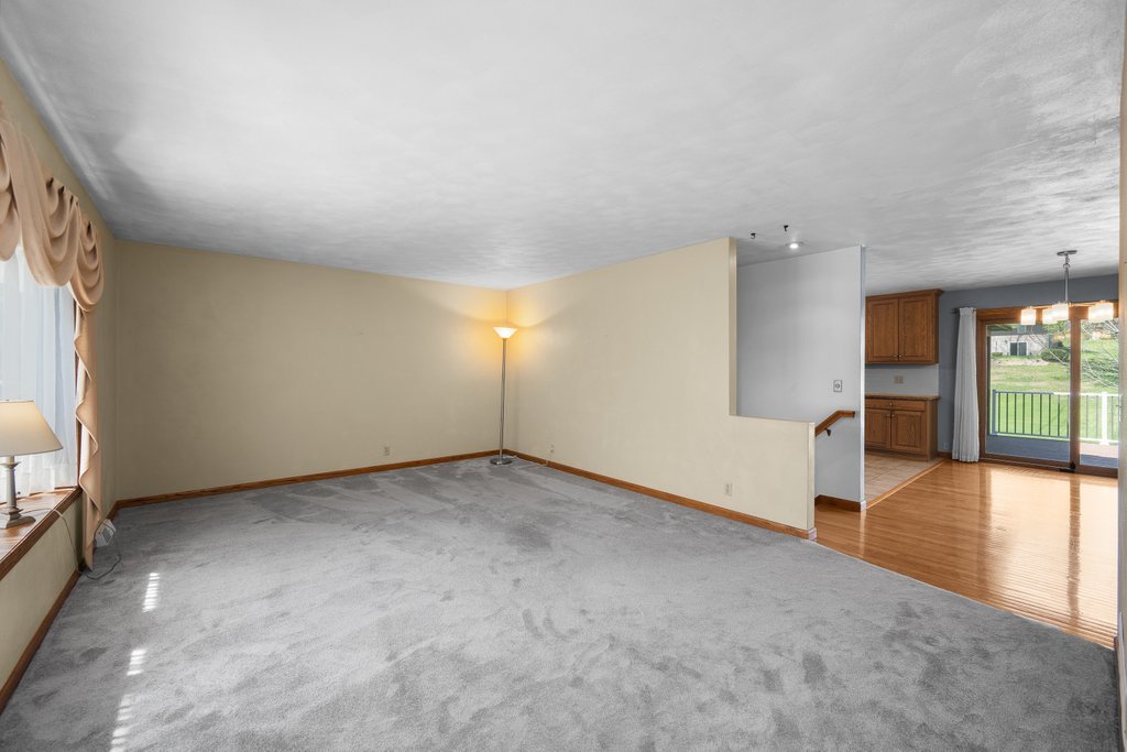207 Amber Lane Geneseo, IL 61254 - Photo 8 of 57 a view of an empty room with glass door