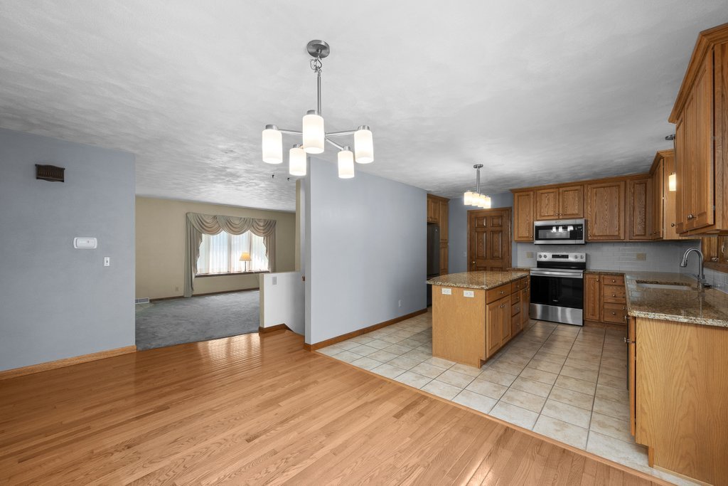 207 Amber Lane Geneseo, IL 61254 - Photo 10 of 57 wooden floor in kitchen and dining room with wooden floor