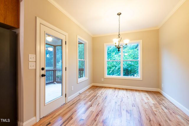 a view of balcony with furniture