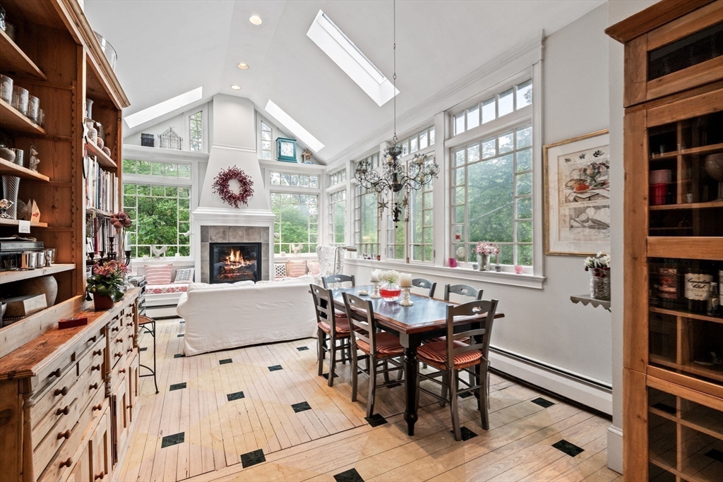 51 Cliff Street Nahant, MA 01908 - Photo 11 of 42 a living room with furniture a fireplace and a large window