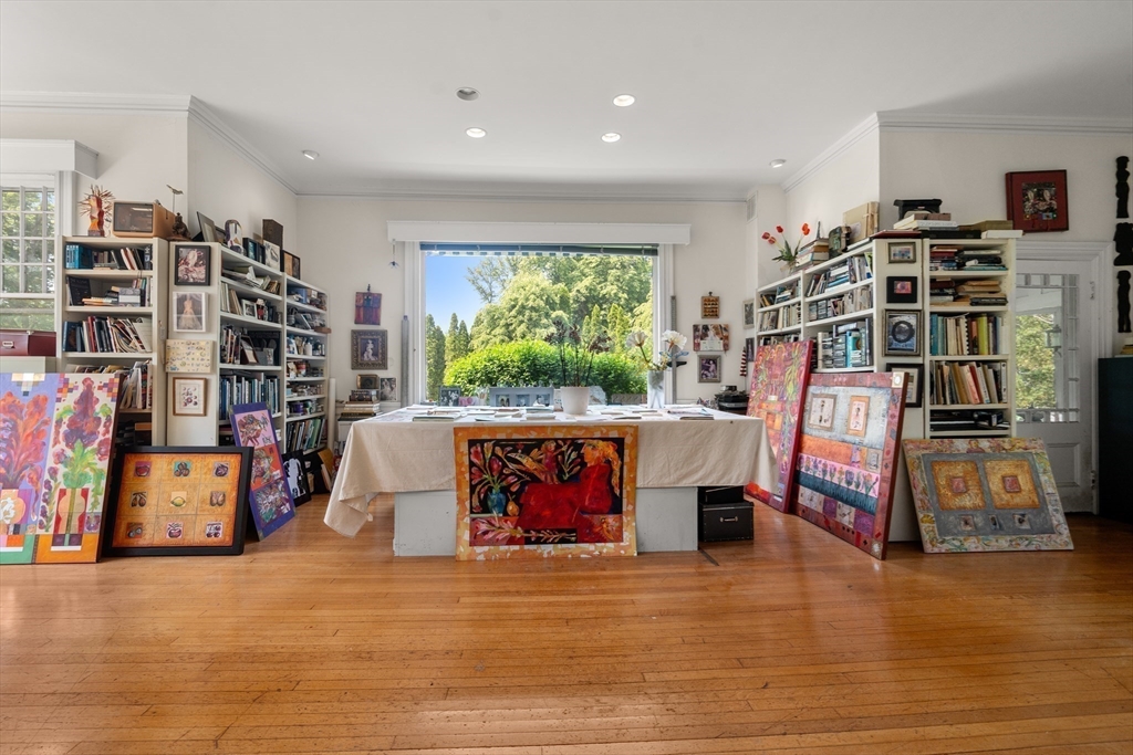 51 Cliff Street Nahant, MA 01908 - Photo 14 of 42 a living room with furniture and a book shelf