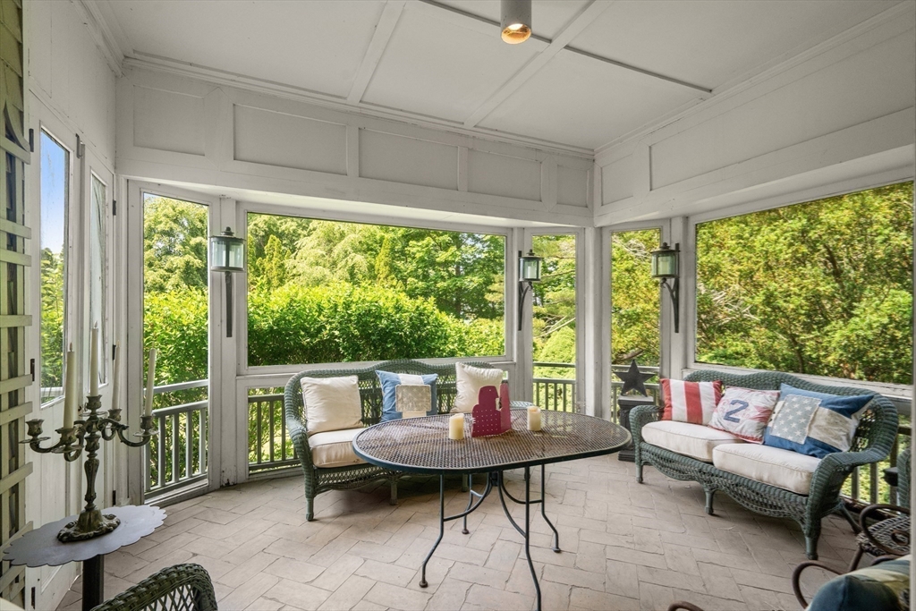 51 Cliff Street Nahant, MA 01908 - Photo 16 of 42 a living room with furniture and a large window