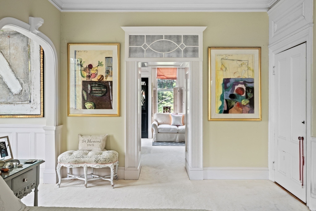 51 Cliff Street Nahant, MA 01908 - Photo 20 of 42 a view of a bedroom with furniture and windows