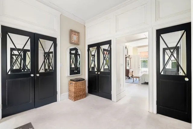 a bathroom with a granite countertop sink a toilet and shower