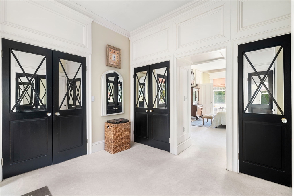 51 Cliff Street Nahant, MA 01908 - Photo 21 of 42 a living room with furniture and a closet