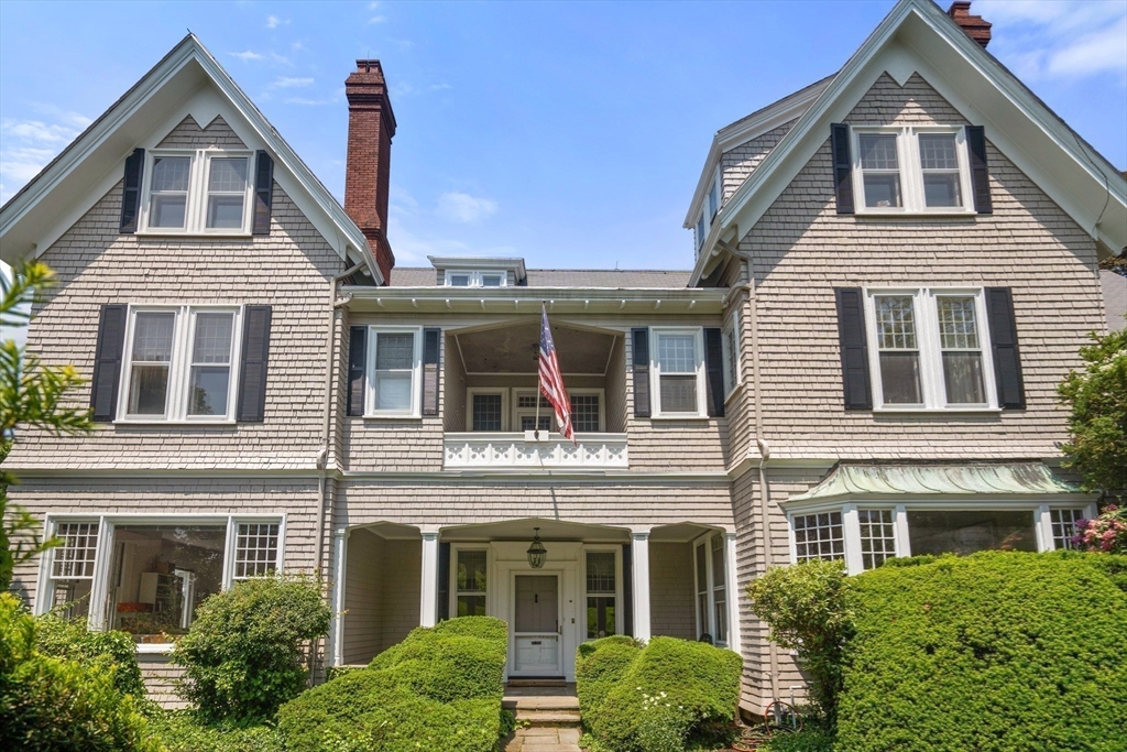 51 Cliff Street Nahant, MA 01908 - Photo 26 of 42 a front view of a house with a yard